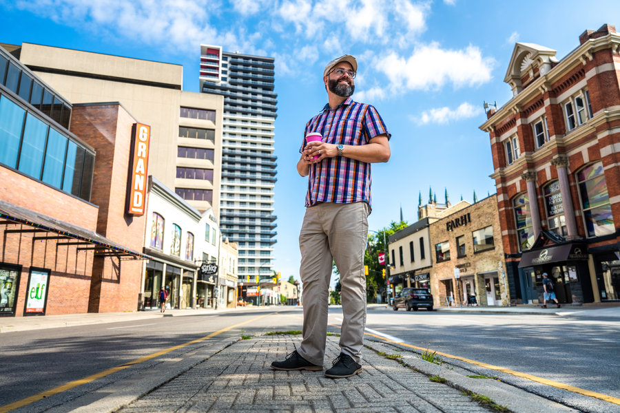 Evan Klassen stands on the paved island in the centre of Richmond Street, by the Grand Theatre.