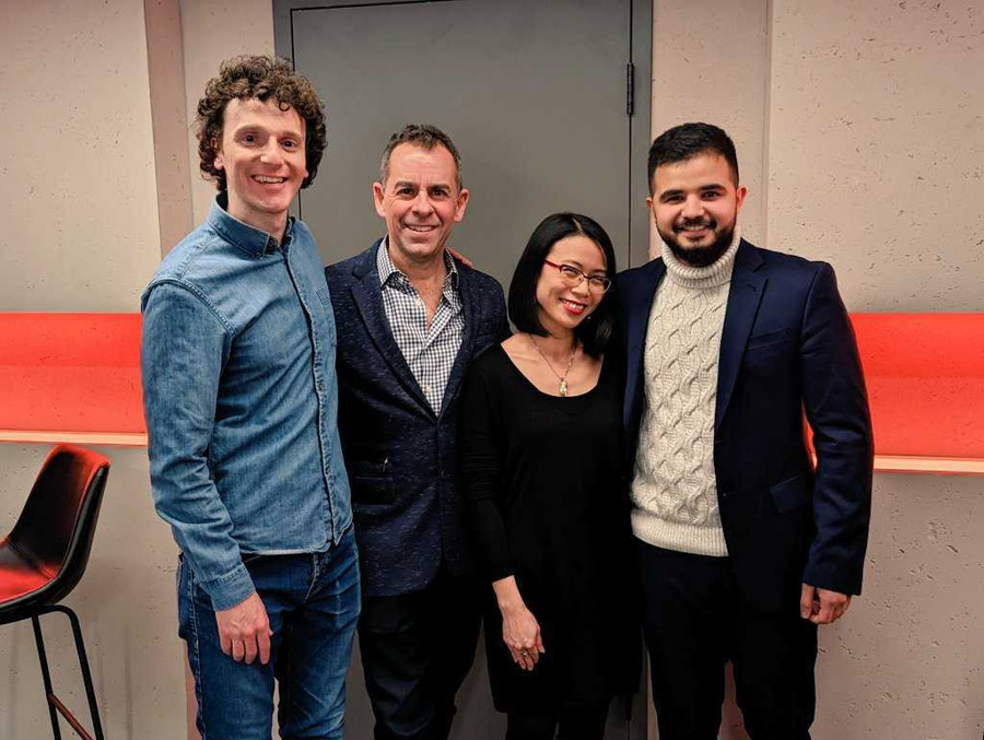 Nabil Traboulsi, Dennis Garnhum, Winnie Yeung, and Abu Bakr Al Rabeeah pose for a photo.