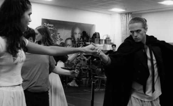 Students rehearse for the 2023 High School Project production of The Phantom of the Opera. Black and white photo.
