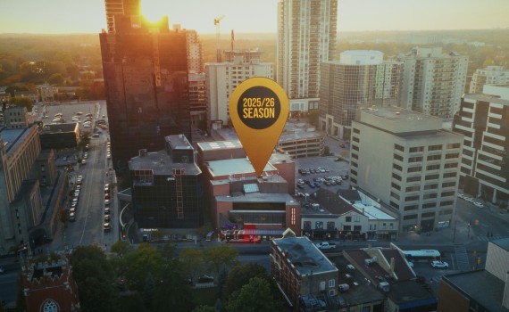 A birds-eye view of a portion of Richmond Street, centred on the Grand Theatre.