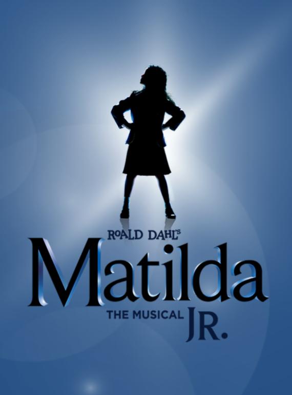 A silhouette of a girl with her hands on her hips stands in front of a blue backdrop. Text reads: Roald Dahl - MATILDA JR The Musical